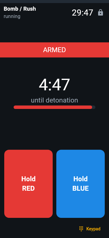 An Android phone as the bomb: the mode's countdown screen ("ARMED", "4:47", "until detonation") above two big buttons, red and blue, to hold.