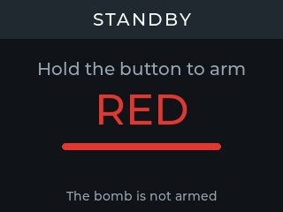 Ecrã da Field Box: cabeçalho «STANDBY», texto «Hold the button to arm», «RED» a vermelho, «The bomb is not armed» em baixo.